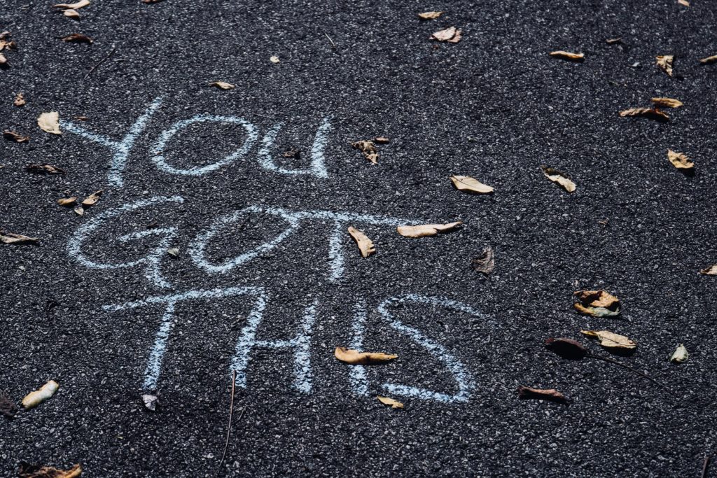 You Got This written in chalk on asphalt.