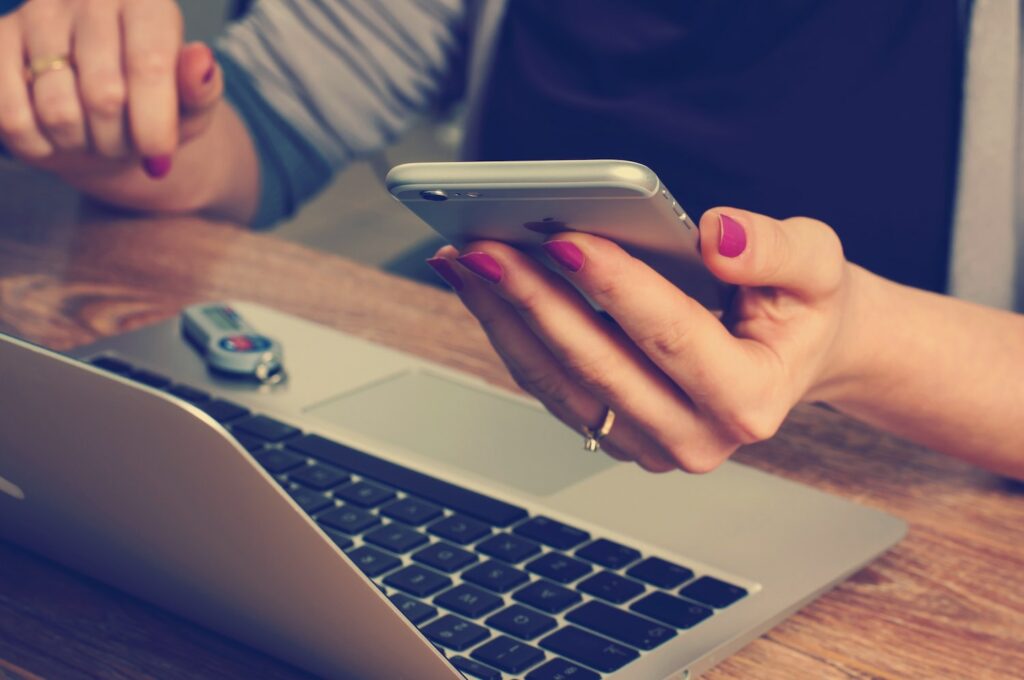 Worker composing emails or text messages